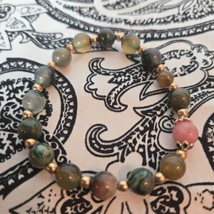 Elegant Multicolor Glass Bead Bracelet With Gold Accent